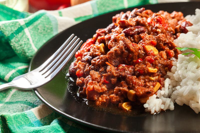 Hot Chili Con Carne with Ground Beef, Beans, Tomatoes and Corn Served ...