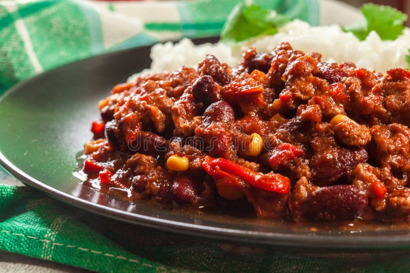 Hot Chili Con Carne with Ground Beef, Beans, Tomatoes and Corn Served ...