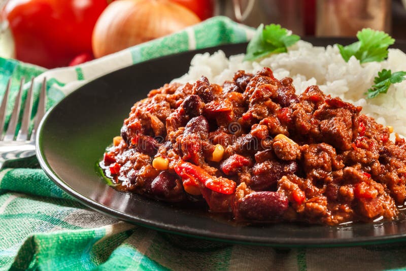 Hot Chili Con Carne With Ground Beef, Beans, Tomatoes And Corn Served ...