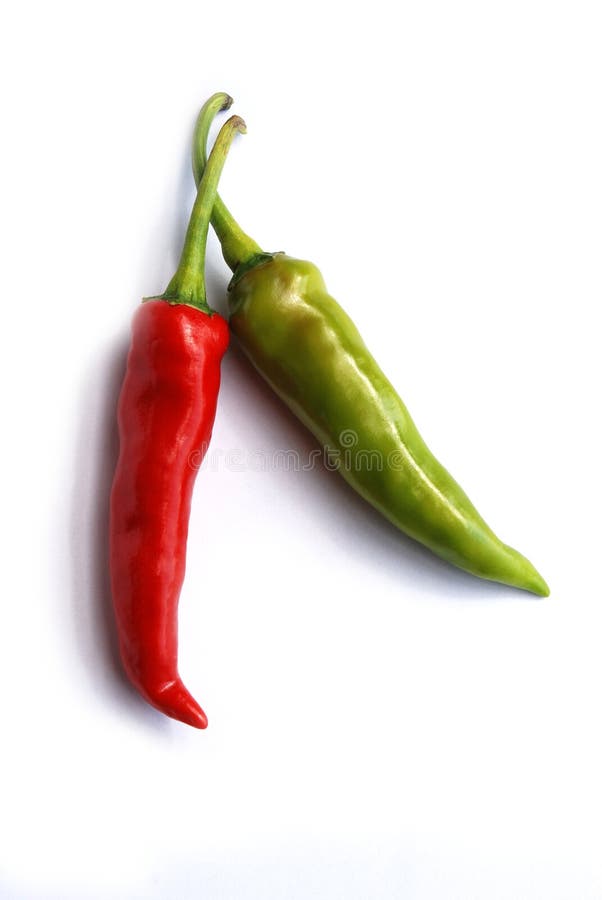 Red and green hot chili peppers isolated on white background