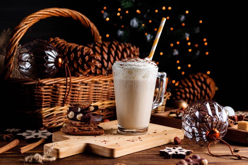 Hot chocolate drink with whipped cream. Cozy Christmas composition on a dark wooden background. Sweet treats for cold royalty free stock photos Hot chocolate drink with whipped cream. Cozy Christmas composition on a dark wooden background. Sweet treats for cold royalty free stock photos