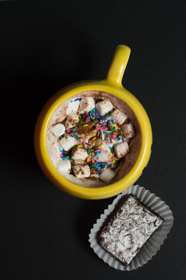 Hot Chocolate in a Mug with Sprinkles and Marshmallows Stock Image