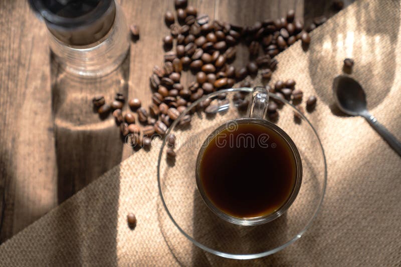 Hot Coffee in a Clear Coffee Cup and Coffee Beans Stock Image Image