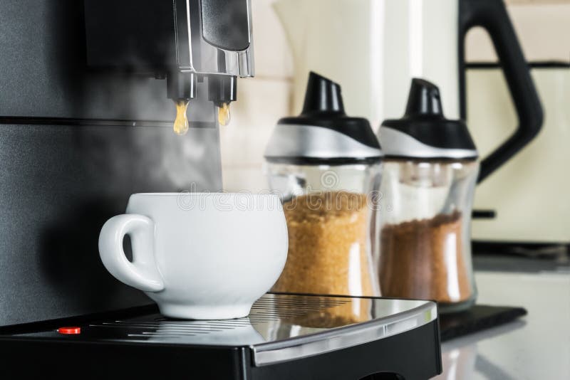 Hot Coffee from the Coffee Machine is Poured into a White Cup Stock Photo Image of machine