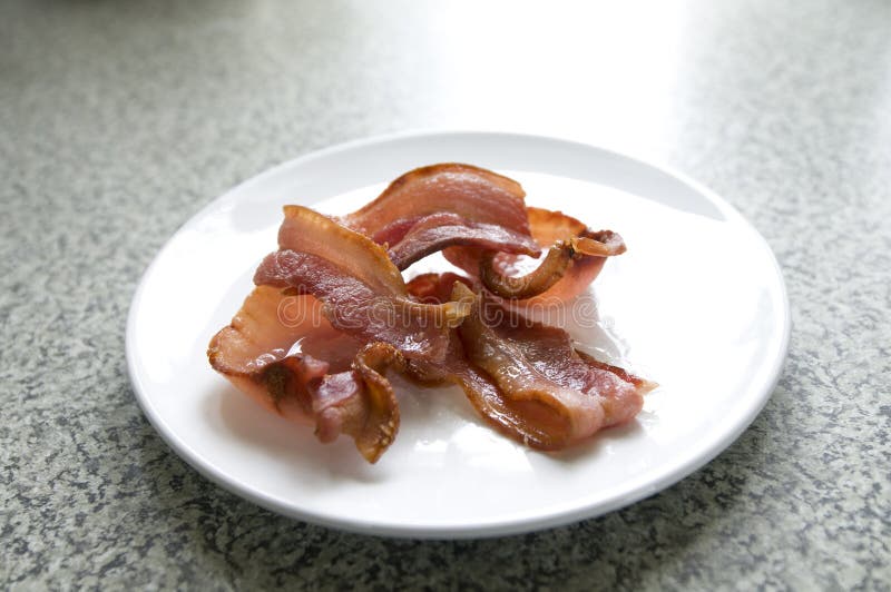 Hot Cooked Bacon on White Plate Stock Photo Image of cooked, white