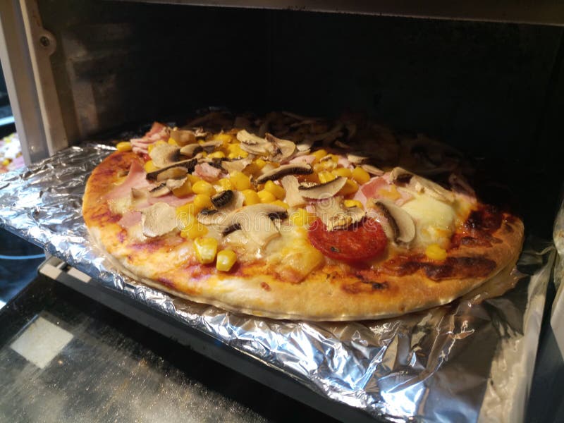 Hot Cooked Pizza on Tin Foil Stock Photo Image of cooked, foil 103511244