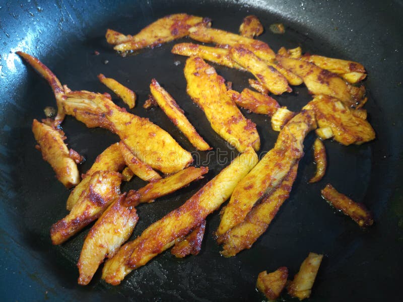 Seasoned Chicken Strips Frying Stock Photo Image of chicken, strips