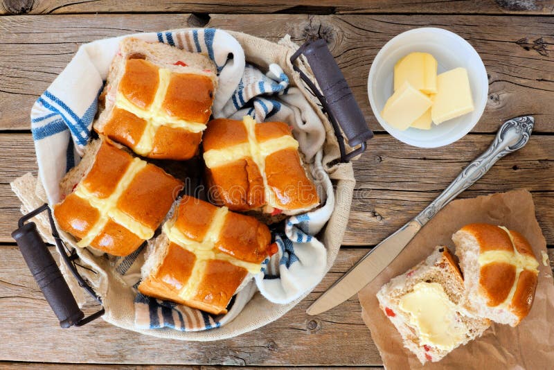 Easter Hot Cross Buns, overhead scene on a rustic wood background. Fruit scene stock images, royalty-free photos and pictures
