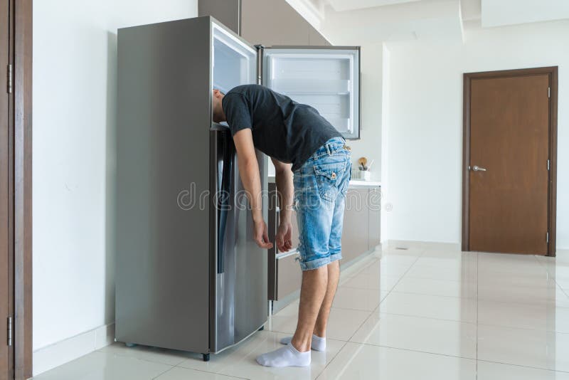On a Hot Day, the Guy Cools with His Head in the Refrigerator. Broken