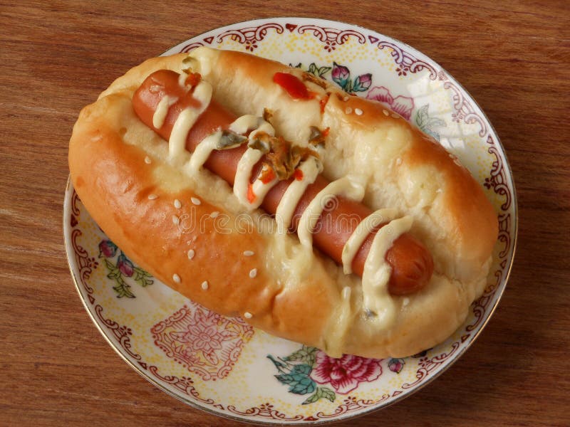 Hot Dog Bun Garnished with Cheese and Sauerkraut Stock Image Image of