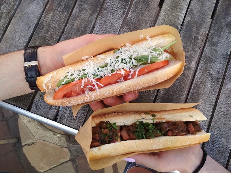 Hot Dog Burger in the Hands Two Street Food Stock Photo  Image of