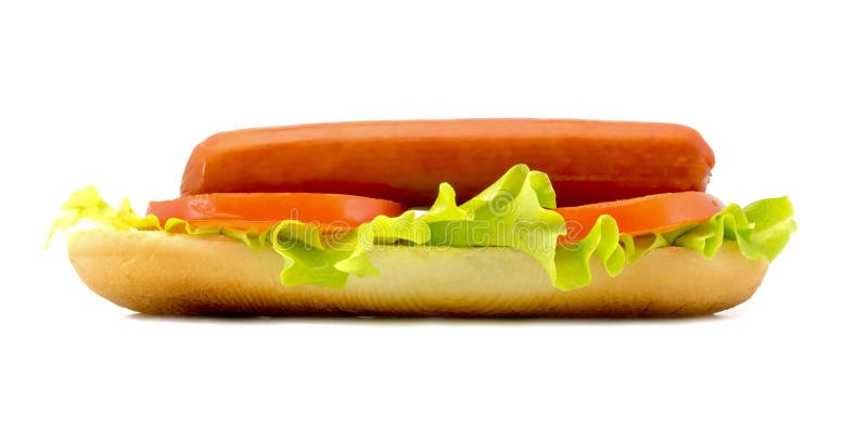 Hot dog with fresh leaf lettuce two slices of tomato and sliced cheese close up isolated on a white stock photo Hot dog with fresh leaf lettuce two slices of tomato and sliced cheese close up isolated on a white stock photo
