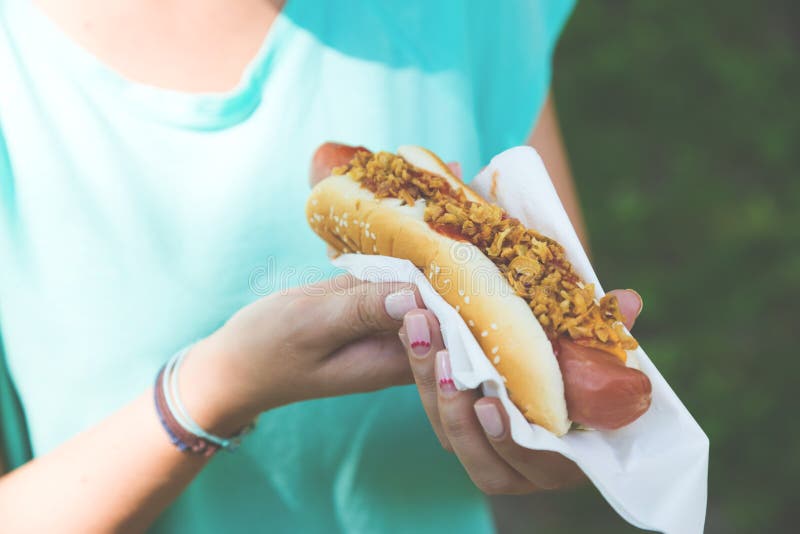 Hot Dog in the Hands of Women Stock Photo Image of park, snacks 82533340