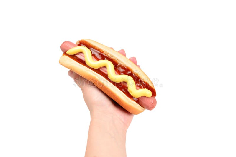 Hot dog in woman hand isolated on white background. Copy space royalty free stock photo Hot dog in woman hand isolated on white background. Copy space royalty free stock photo