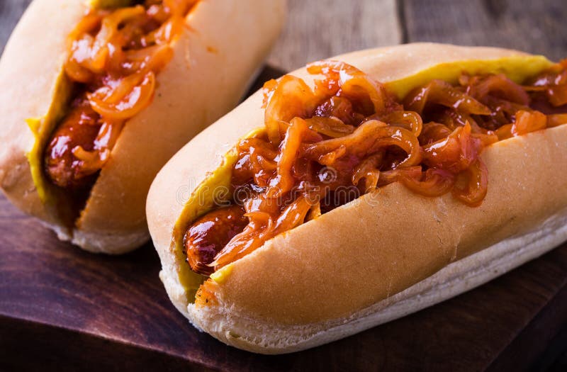 Hot dogs with the onion sauce on top royalty free stock photography Hot dogs with the onion sauce on top royalty free stock photography