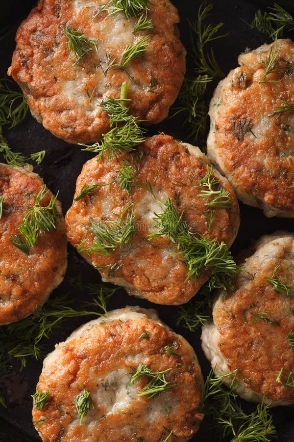 Hot Fish Cakes with Dill Macro. Vertical Top View Stock Photo Image