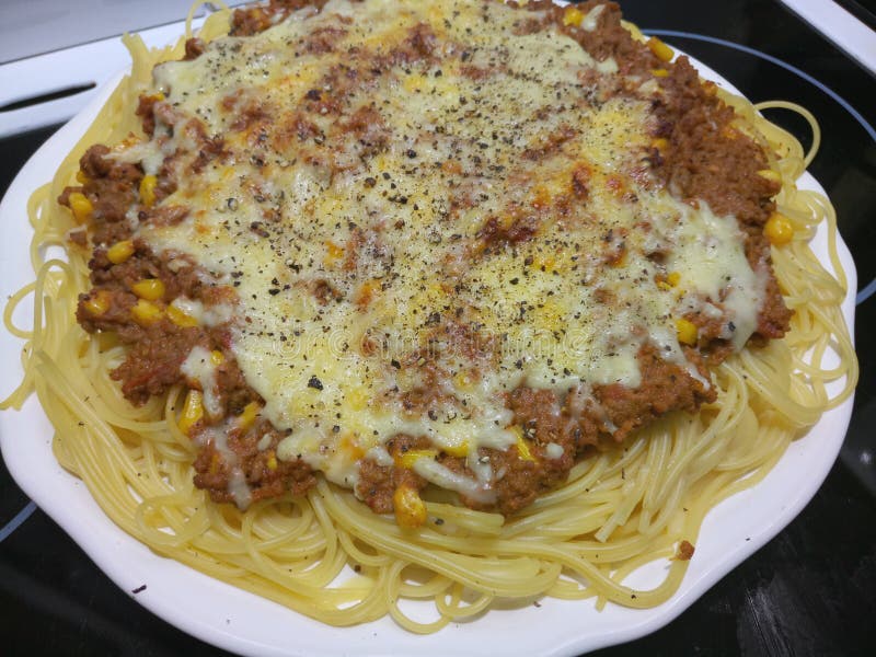 Melted Cheddar Cheese on Spaghetti Bolognese Stock Image Image of