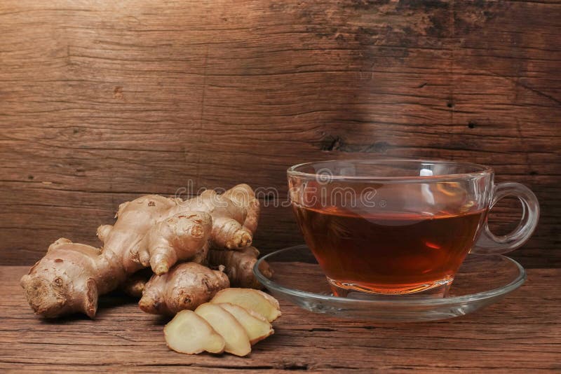 Hot Ginger Water Herbal Healthy Drinks Health Care for Cough Sore with Ginger Slice, Stock Image