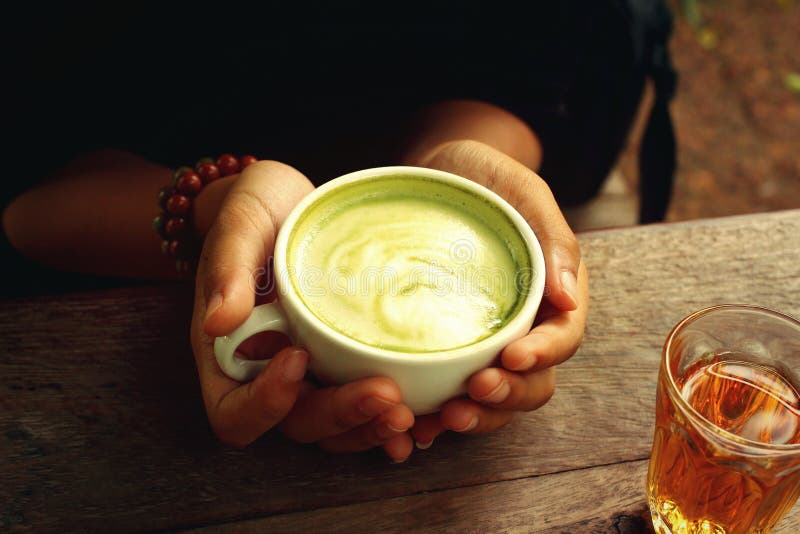 Hot green tea and milk stock photo. Image of yummy, glass 57833008