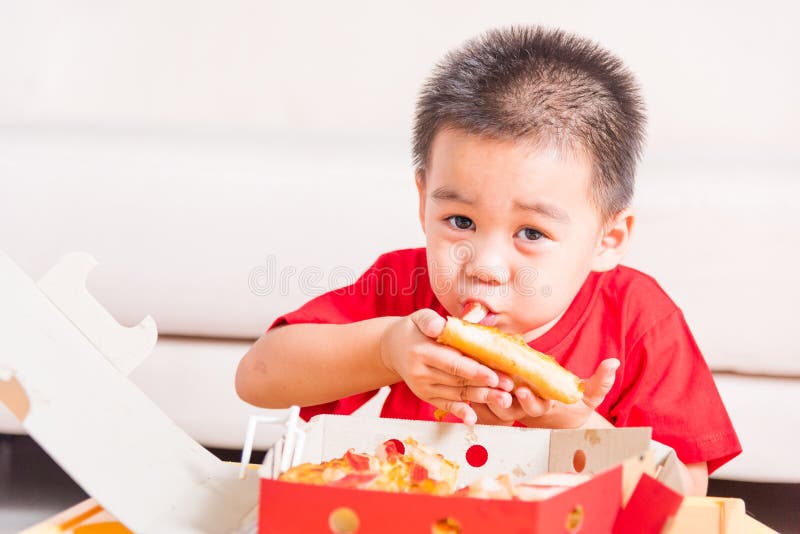 Little Child Enjoying Eating Delivery Stock Image - Image of childhood