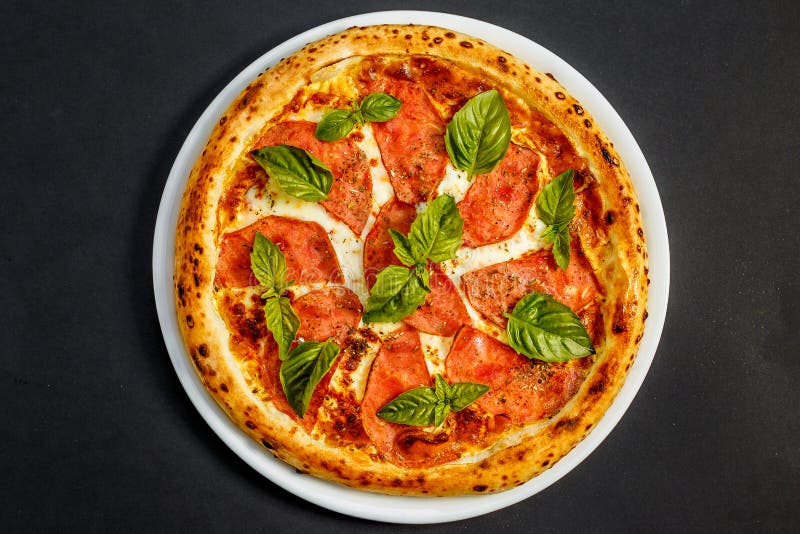 Hot Italian Pizza with Cheese and Basil, Isolated Stock Photo Image