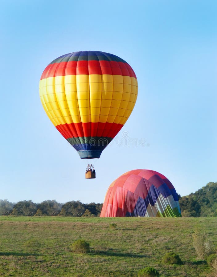 Hoat lufta att landa för ballonger arkivfoto Hoat lufta att landa för ballonger arkivfoto