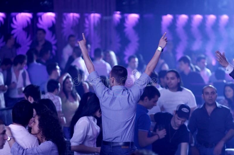 Hot party people in the nightclub (dancehall) royalty free stock photography Hot party people in the nightclub (dancehall) royalty free stock photography