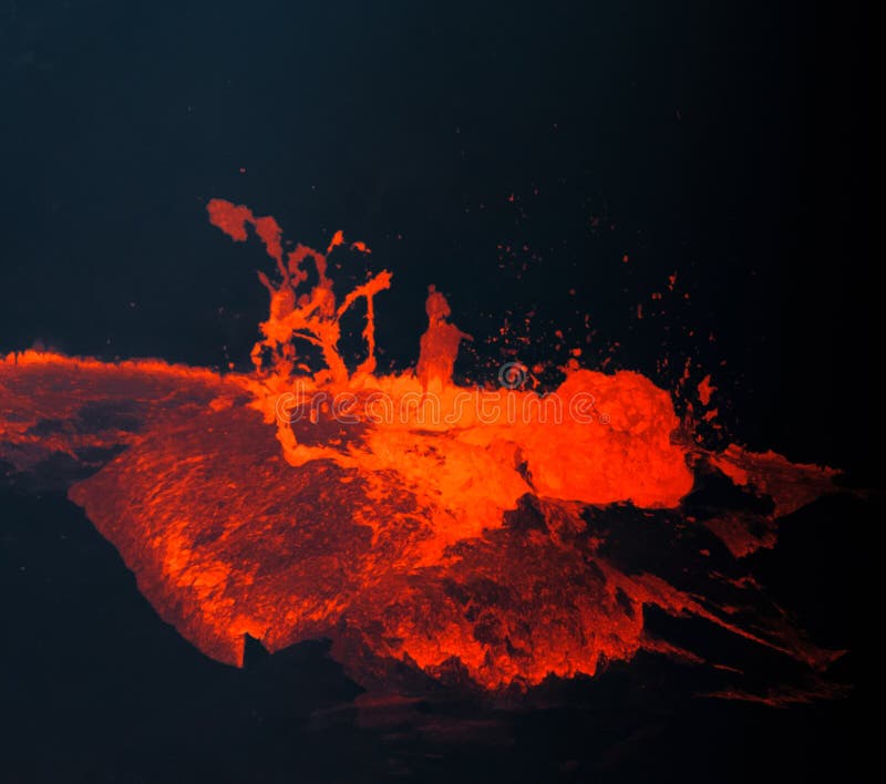 Hot, red, molten lava bubbles to the surface in Hawaii stock images Hot, red, molten lava bubbles to the surface in Hawaii stock images