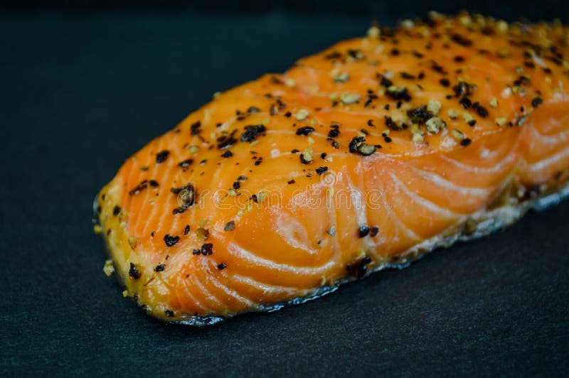 Hot Smoked Salmon Steak Flavored with Black Pepper on a Slate Tray ...