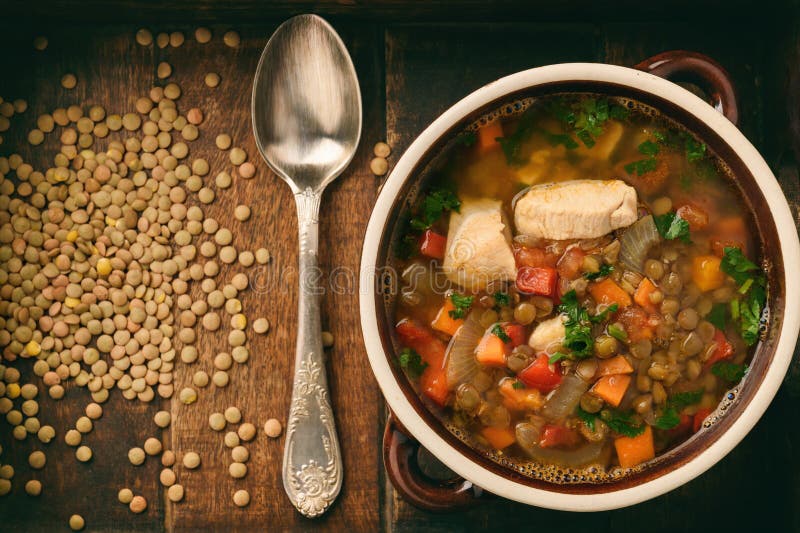Hot Soup with Green Lentil, Chicken, Vegetables and Spices. Stock Photo