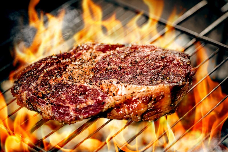 Hot Spicy Steak Grilling on a Summer Barbecue Over the Hot Coals ...