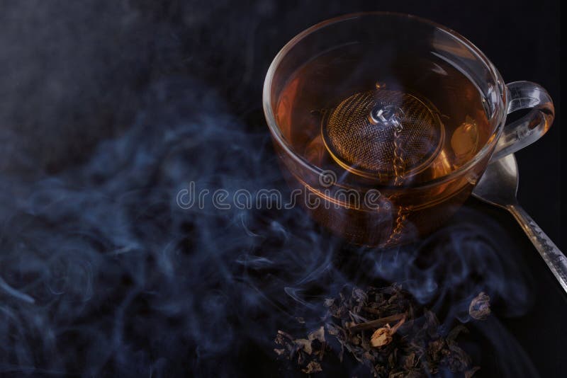 https://thumbs.dreamstime.com/b/hot-tea-clear-glass-smoke-table-black-background-hot-tea-clear-glass-smoke-table-209834513.jpg