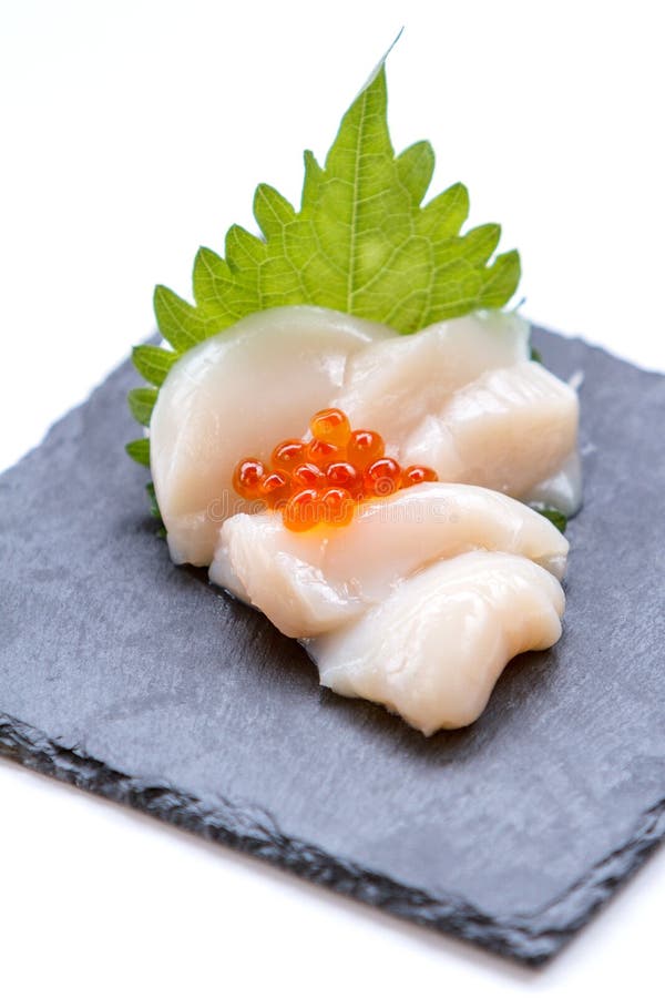 Hotate Scallop Sashimi Served with Ikura Salmon Roe and Sliced Radish on The Black Stone Plate