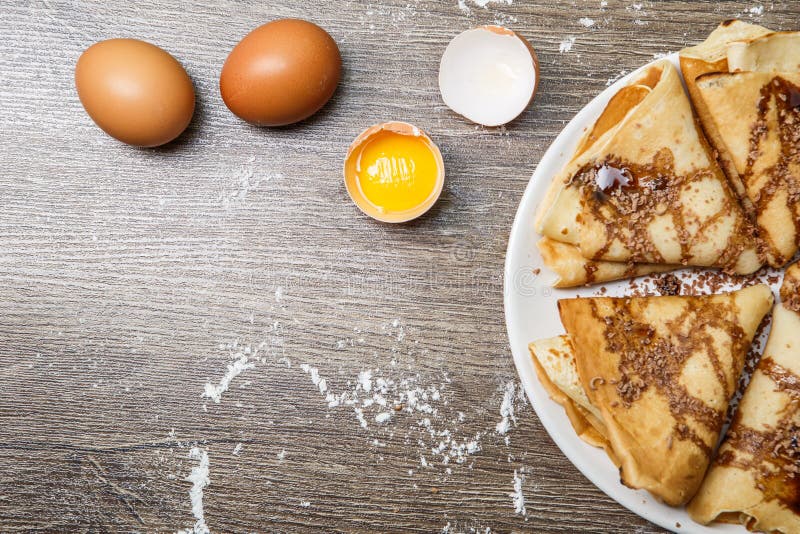 Hotcakes with syrup on plate