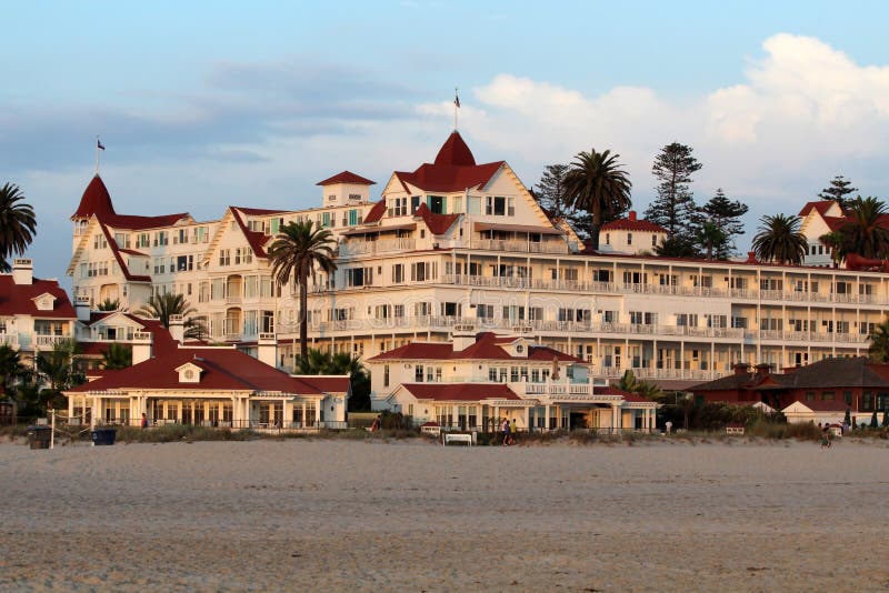 Hotel del Coronado (also known as The Del and Hotel Del) is a beachfront luxury hotel in the city of Coronado, just across the San Diego Bay from San Diego, California. It is one of the few surviving examples of an American architectural genre: the wooden Victorian beach resort. It is the second largest wooden structure in the United States and was designated a National Historic Landmark in 1977. It has hosted celebrities, the wealthy, and several American presidents. Hotel del Coronado (also known as The Del and Hotel Del) is a beachfront luxury hotel in the city of Coronado, just across the San Diego Bay from San Diego, California. It is one of the few surviving examples of an American architectural genre: the wooden Victorian beach resort. It is the second largest wooden structure in the United States and was designated a National Historic Landmark in 1977. It has hosted celebrities, the wealthy, and several American presidents.