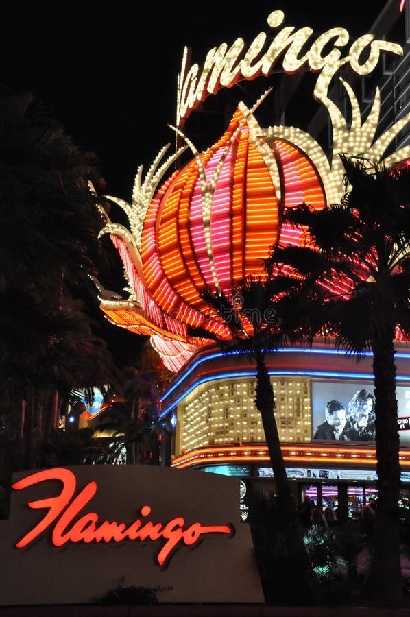 LAS VEGAS - DECEMBER 4: The famous Flamingo Hotel at night on December 4, 2012 in Las Vegas, Nevada. It was the third resort to open on the Strip & the oldest resort on the Strip still in operation. LAS VEGAS - DECEMBER 4: The famous Flamingo Hotel at night on December 4, 2012 in Las Vegas, Nevada. It was the third resort to open on the Strip & the oldest resort on the Strip still in operation.