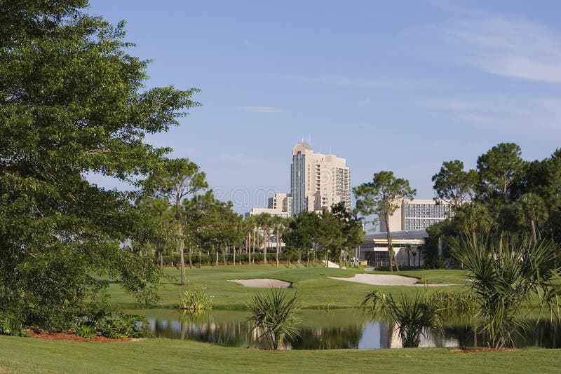 Golf course with hotel in background. Golf course with hotel in background