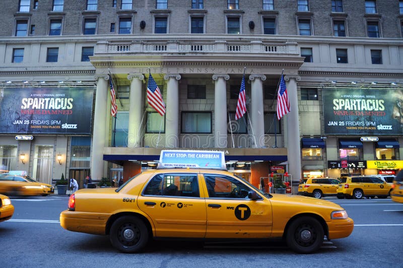 Hotel Pennsylvania Facade and yellow cab, at 7th Avenue (Fashion Avenue), Manhattan, New York City, USA. Hotel Pennsylvania Facade and yellow cab, at 7th Avenue (Fashion Avenue), Manhattan, New York City, USA