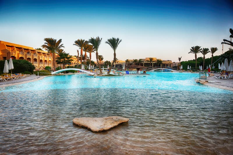 Hotel pool in Egypt stock photo. Image of luxury, tourist 139919640