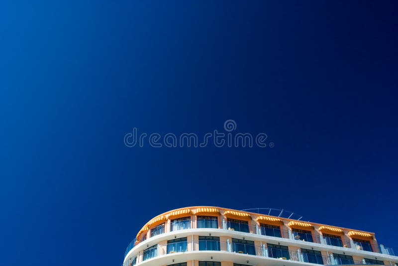 Hotel projected over blue sky