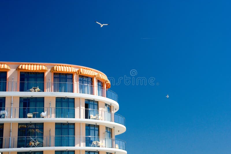 Hotel projected over blue sky