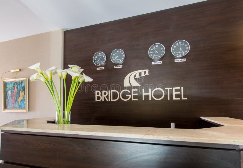 The Hotel Reception with Desk and Clocks Stock Photo Image of