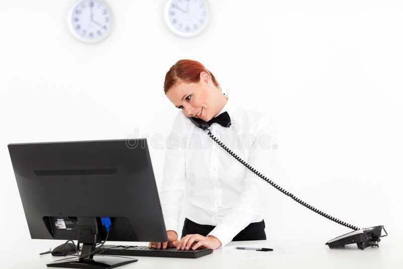 Hotel receptionist stock photo