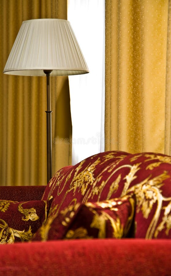 An interior view of an upscale home or hotel room. An interior view of an upscale home or hotel room.