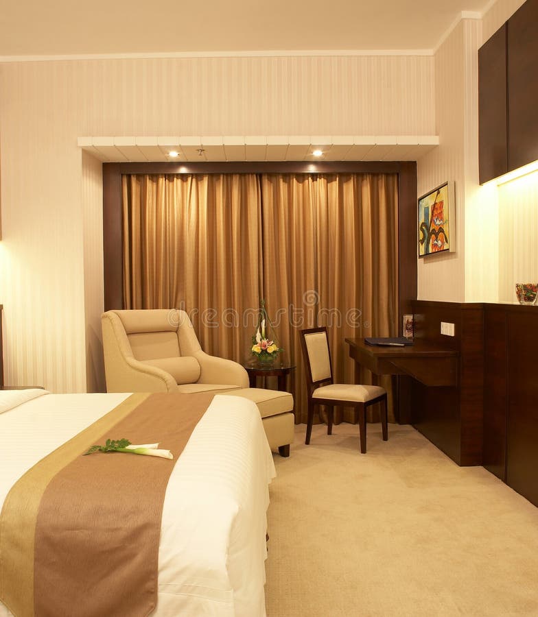 Hotel-Schlafzimmer stockbild. Bild von kissen, steppdecke - 23238225