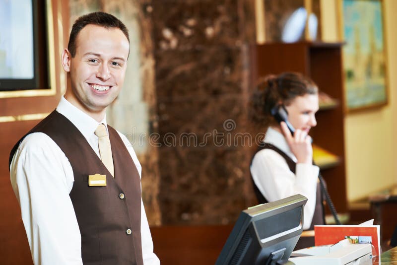 Hotel worker on reception stock image. Image of motel 43814271