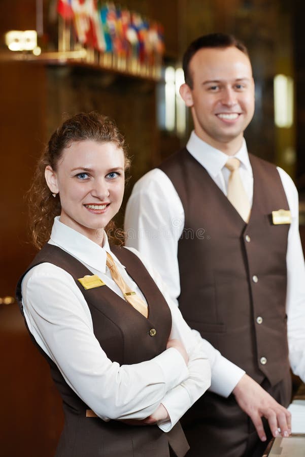 Hotel workers on reception stock photography