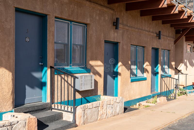 Mexican Hat, Utah - May 11, 2021: Hotel room exterior doors at the San Juan Inn, along the San Juan river. Mexican Hat, Utah - May 11, 2021: Hotel room exterior doors at the San Juan Inn, along the San Juan river