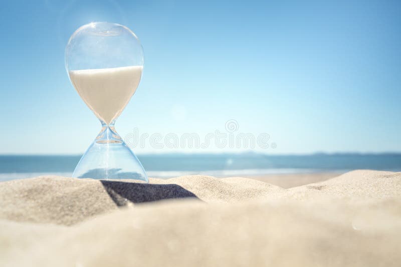 Hourglass czas na plaży w piasku