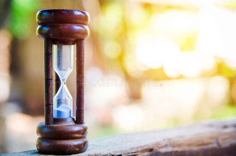 Hourglass time passing concept for business deadline, urgency and running out of time